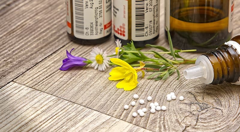 Homeopathic remedy bottles with white globules